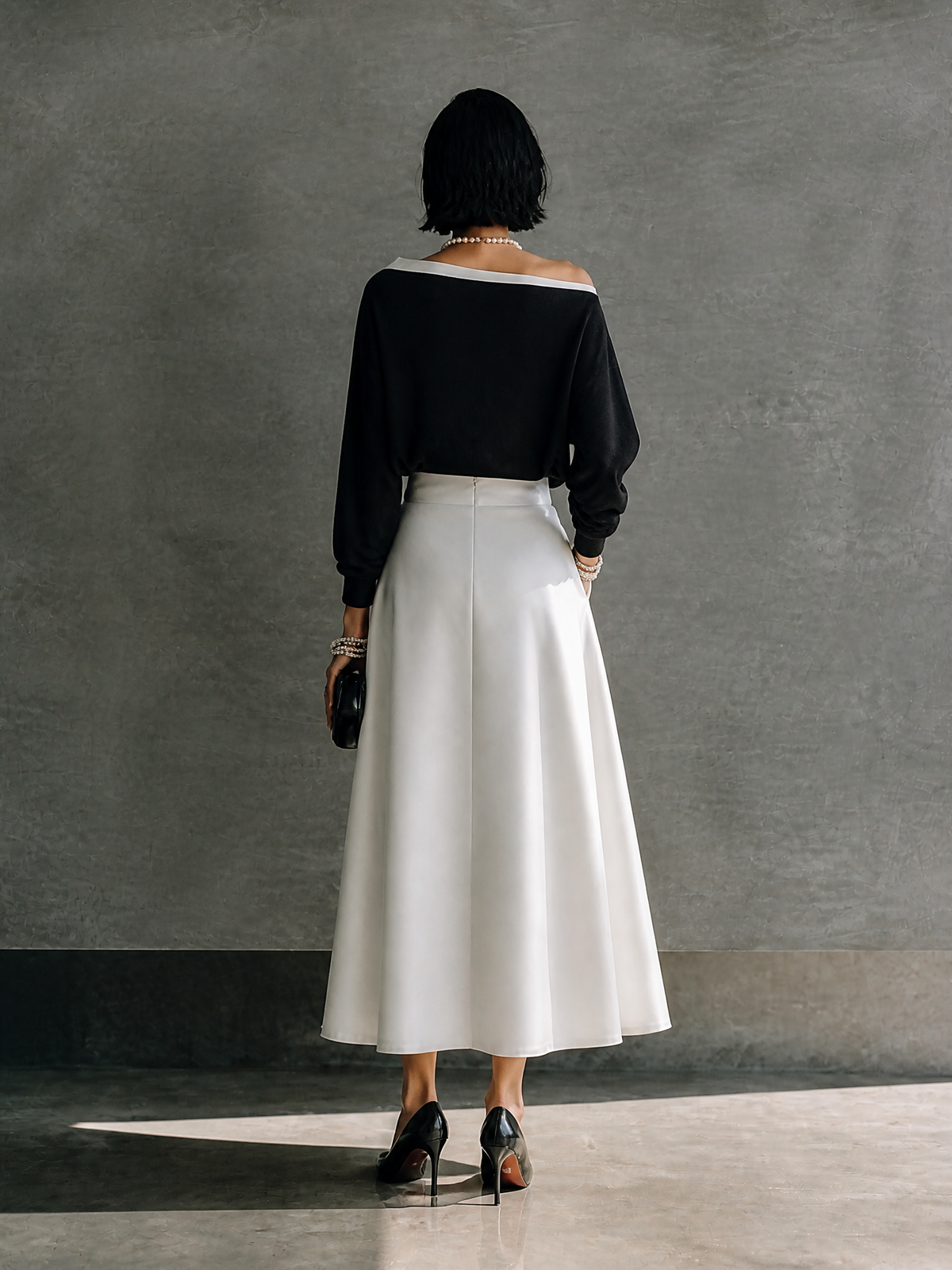 Tiziana — Completo due pezzi in raso con gonna midi nero e bianco