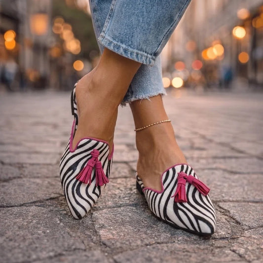 Severina — Mules a punta con nappine
