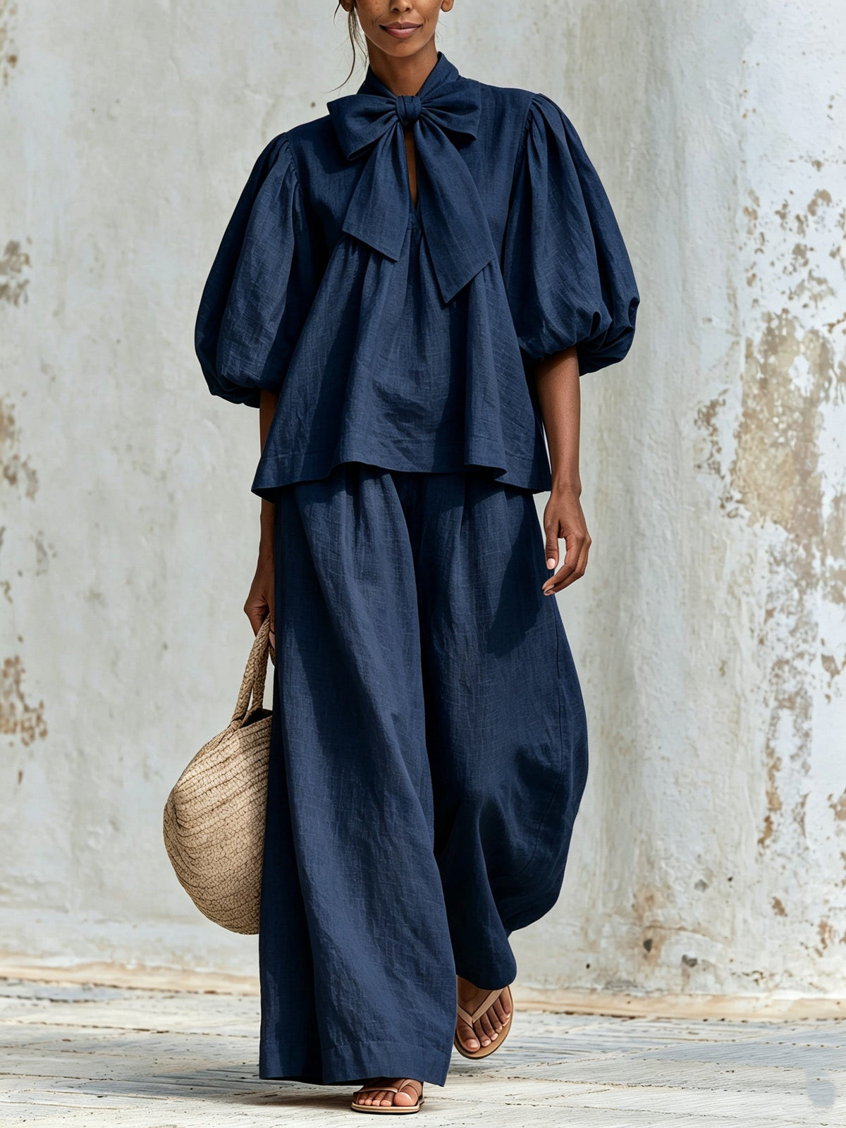 Delia — Completo con top a fiocco e pantaloni a gamba larga