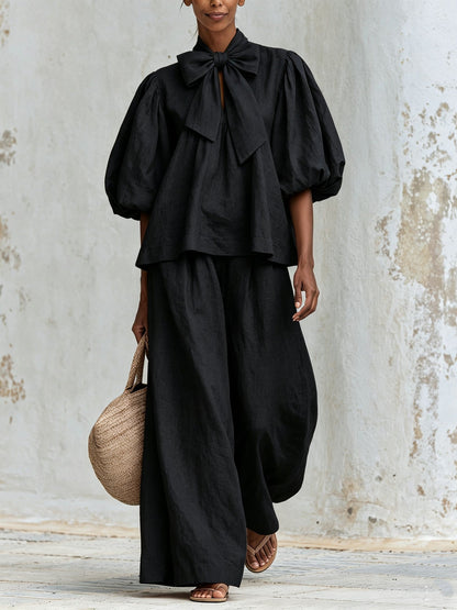 Delia — Completo con top a fiocco e pantaloni a gamba larga