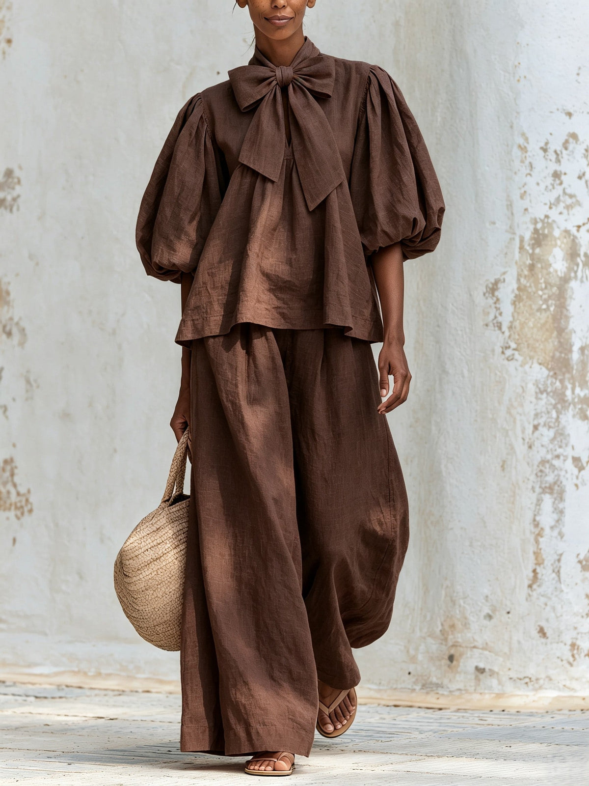 Delia — Completo con top a fiocco e pantaloni a gamba larga