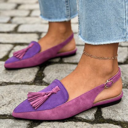Marisa — Mules aperti sul tallone con nappine