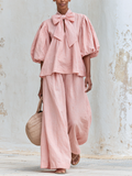 Delia — Completo con top a fiocco e pantaloni a gamba larga