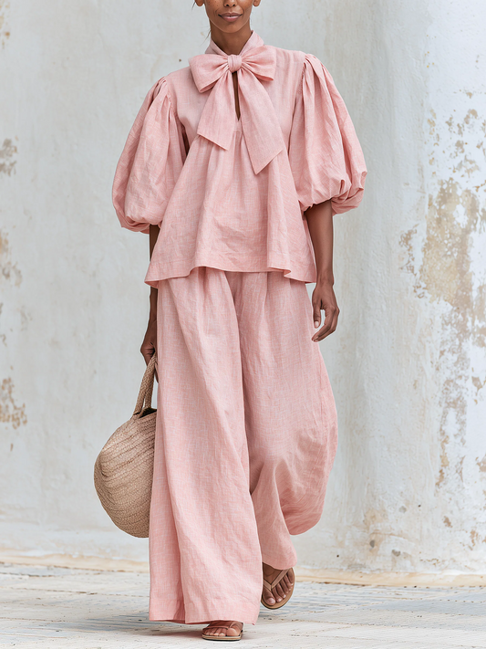 Delia — Completo con top a fiocco e pantaloni a gamba larga