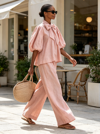 Delia — Completo con top a fiocco e pantaloni a gamba larga