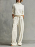 Elena — Completo due pezzi in maglia con pantaloni a gamba larga crema