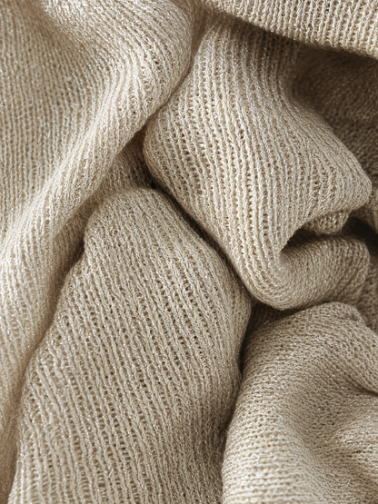 Carmela — Completo due pezzi in maglia con pantaloni a gamba larga beige