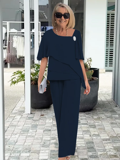 Vincenza — Completo con blusa asimmetrica e pantaloni a gamba larga