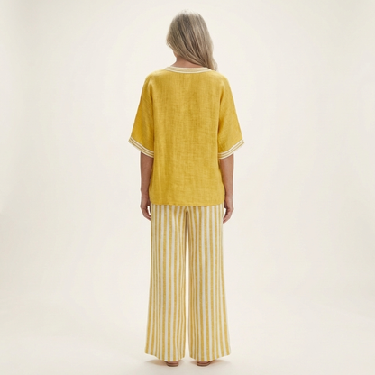 Giovanna — Completo con top a V e pantaloni a righe