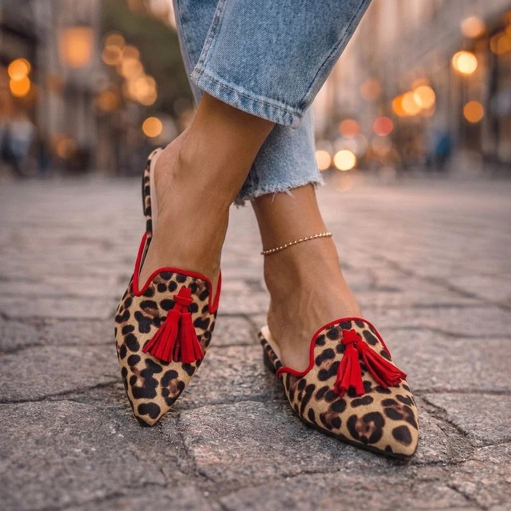 Severina — Mules a punta con nappine