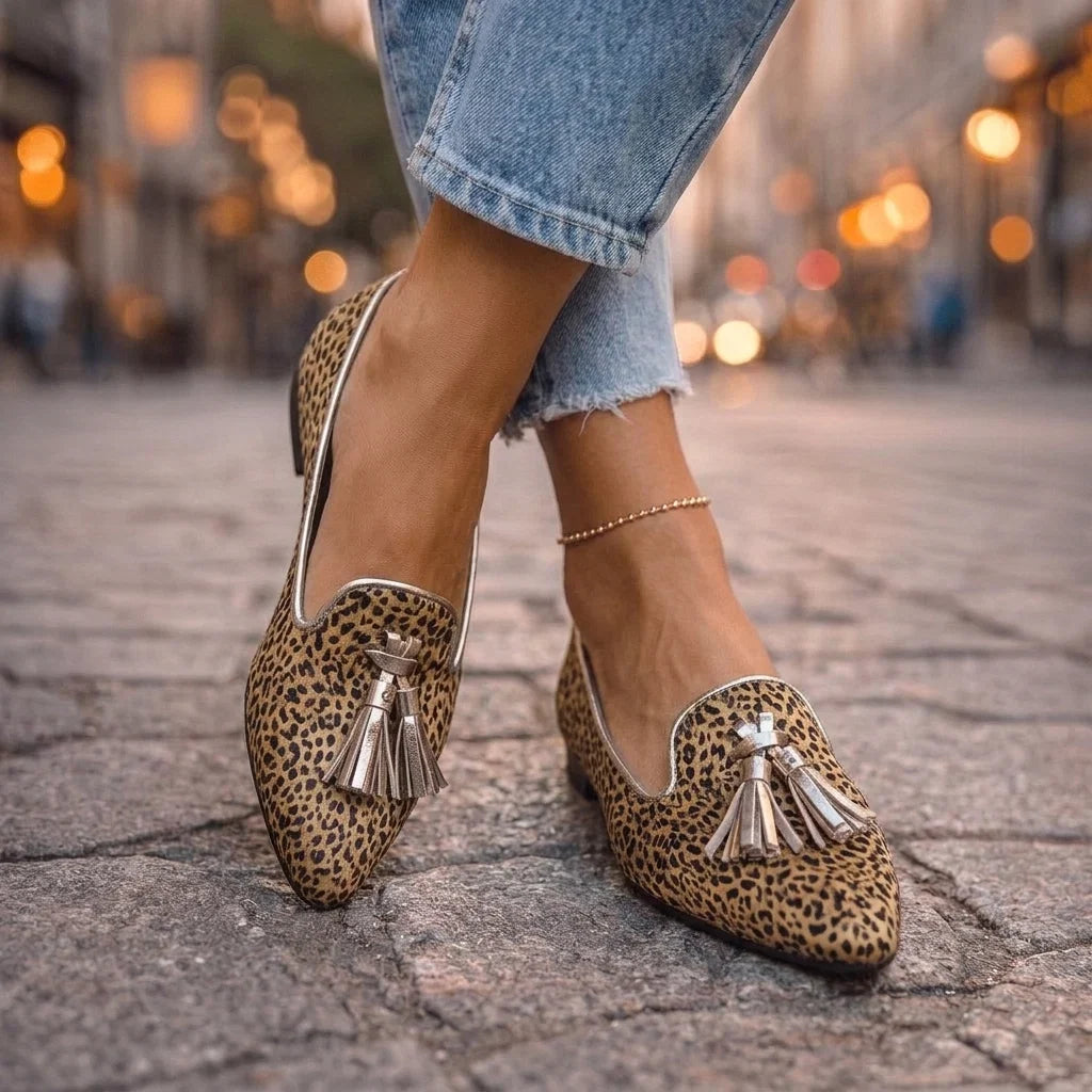 Dalia — Mocassini con nappine e stampa animalier