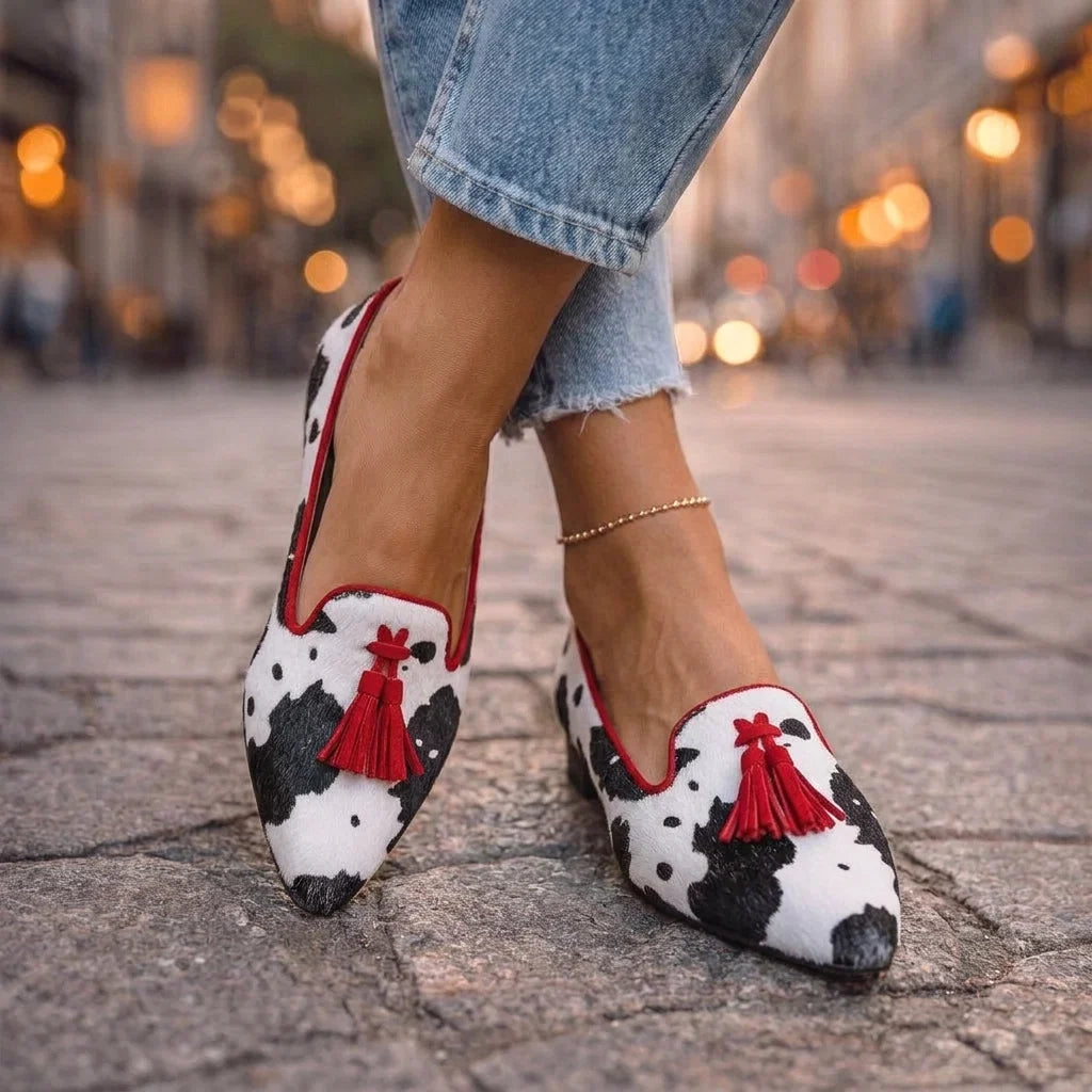 Dalia — Mocassini con nappine e stampa animalier