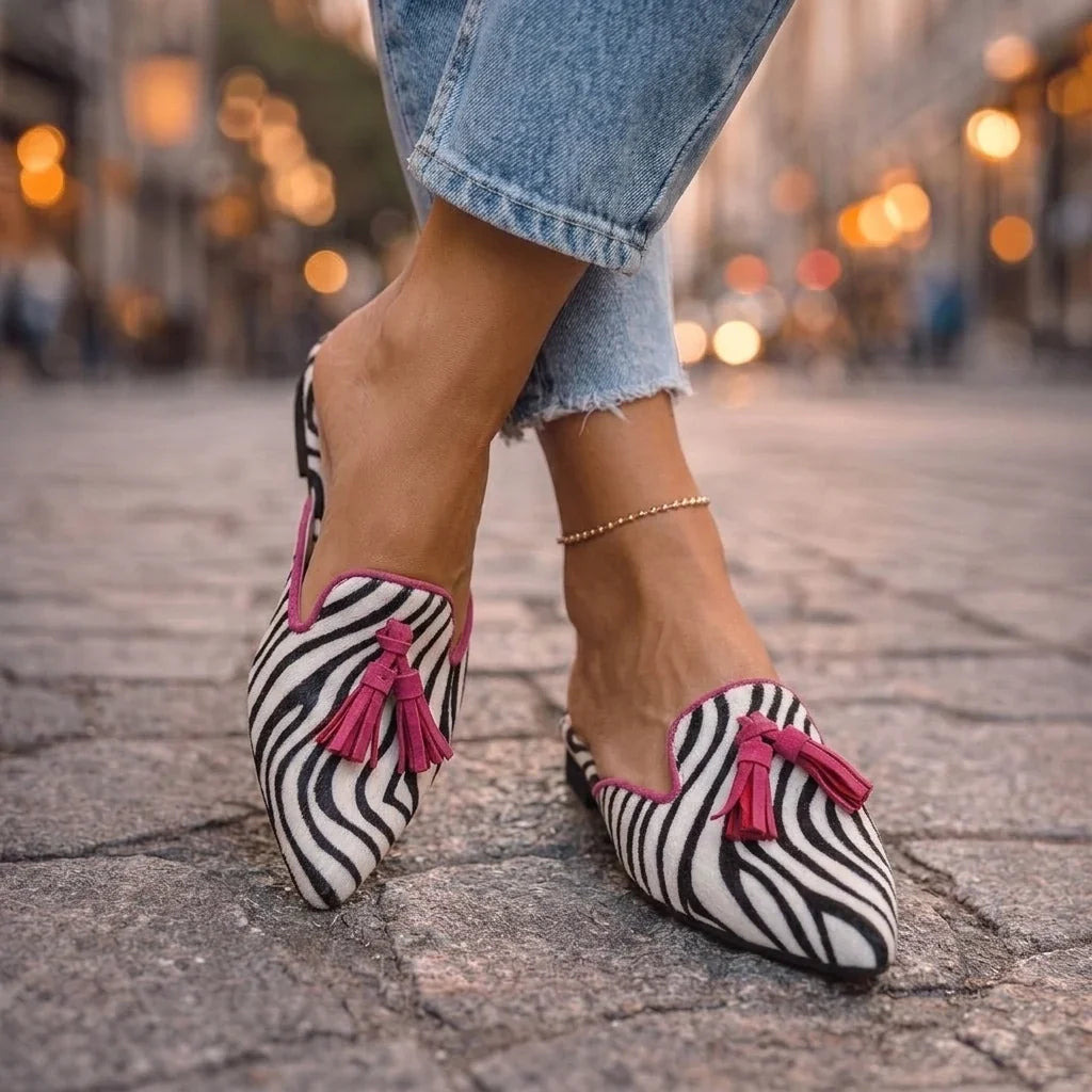 Severina — Mules a punta con nappine